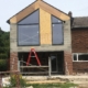 2 Aluminium Shaped Windows & 2 section Slider